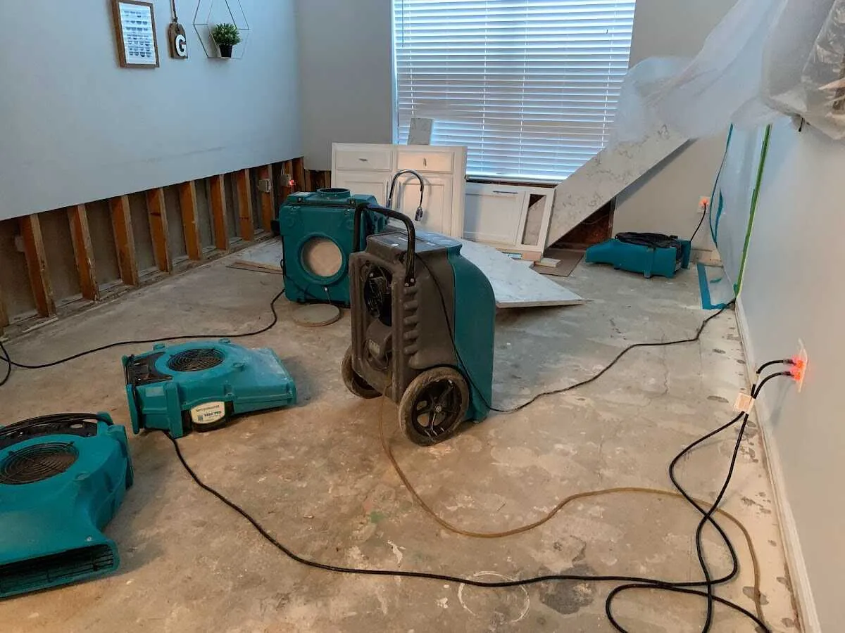Dehumidifier in flood-cut room for Water Damage Restoration in Chesapeake